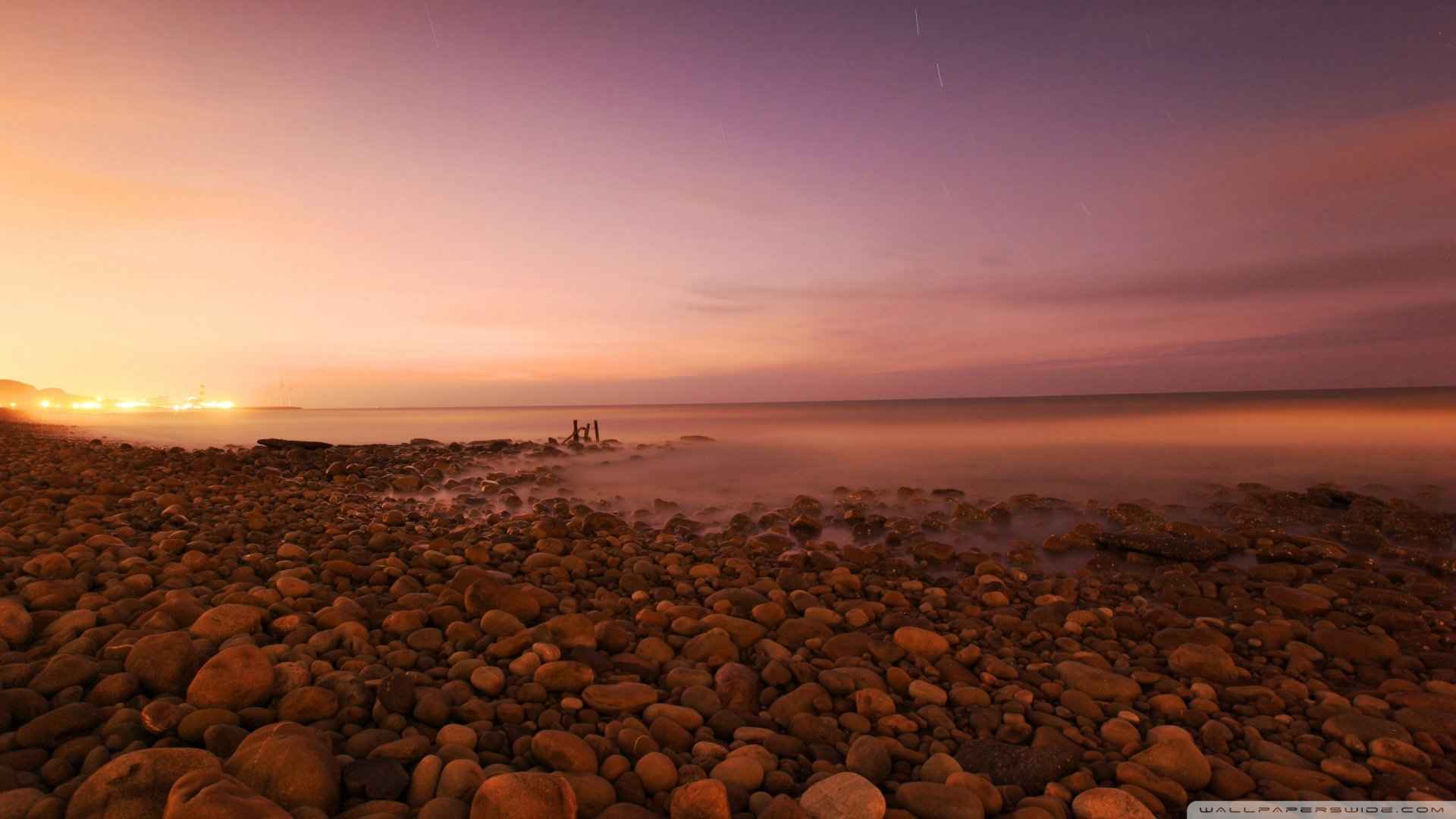 夕阳下的沙滩唯美图片高清电脑桌面壁纸下载-