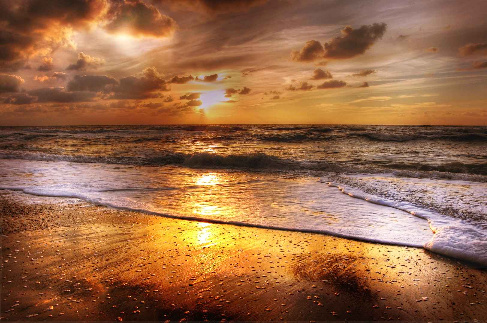 日落 海滩 海浪 图片