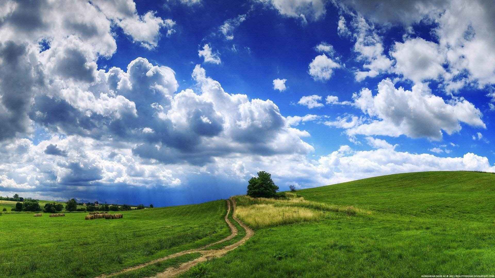 唯美风景之白云，草地，盘山公路