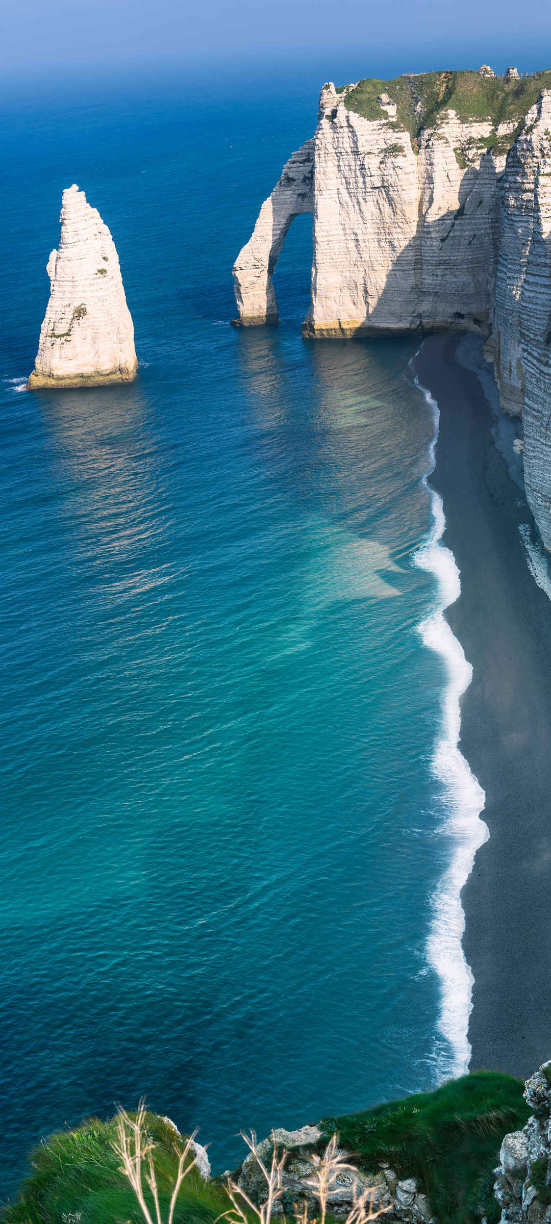 海边 岩石 蓝色大海壁纸手机图片大全-